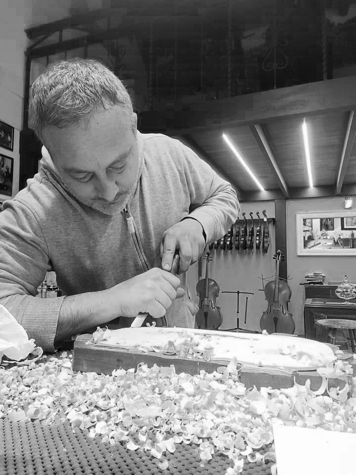 Fabio Nicotra working on acoustic setup and sound adjustment in his violin making atelier in Palermo